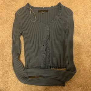 dark blue, button up, ruffle trimmed sweater